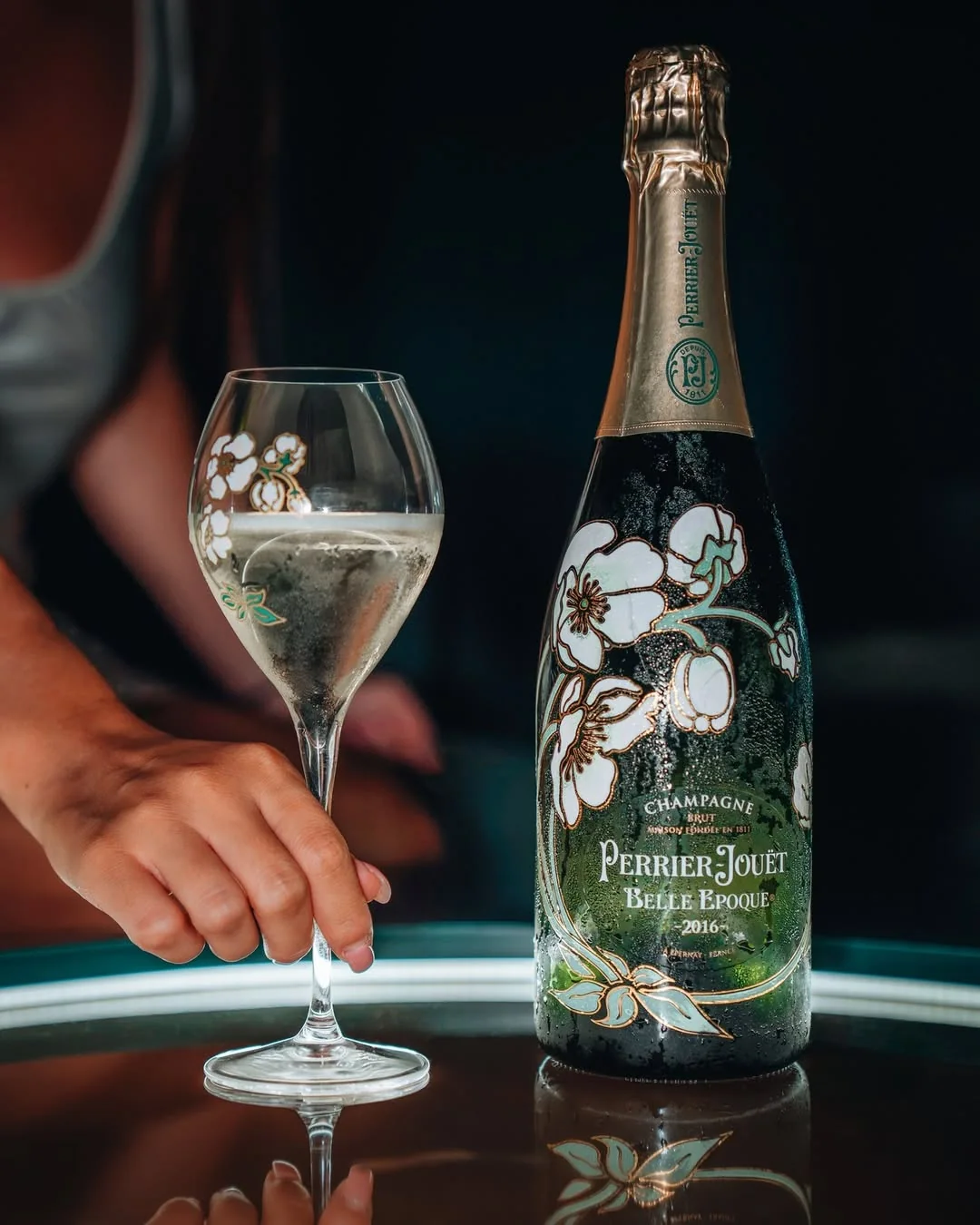 A bottle of Perrier-Jouët and a glass on a table at Jimmy'z.