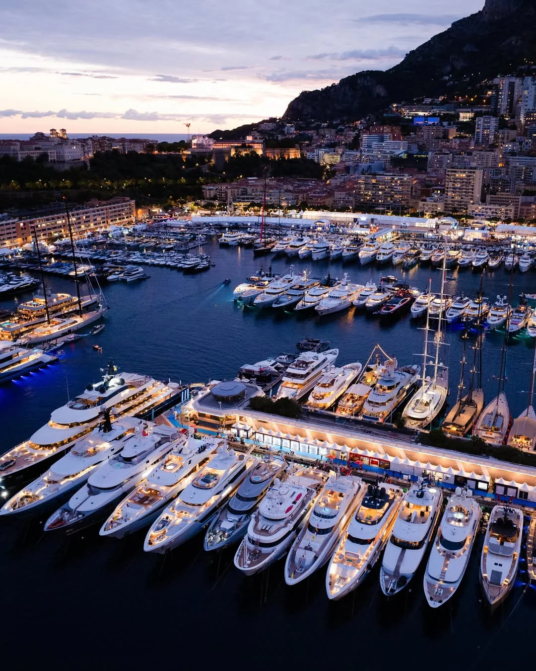 Port Hercule at dusk, the quays full of yachts.
